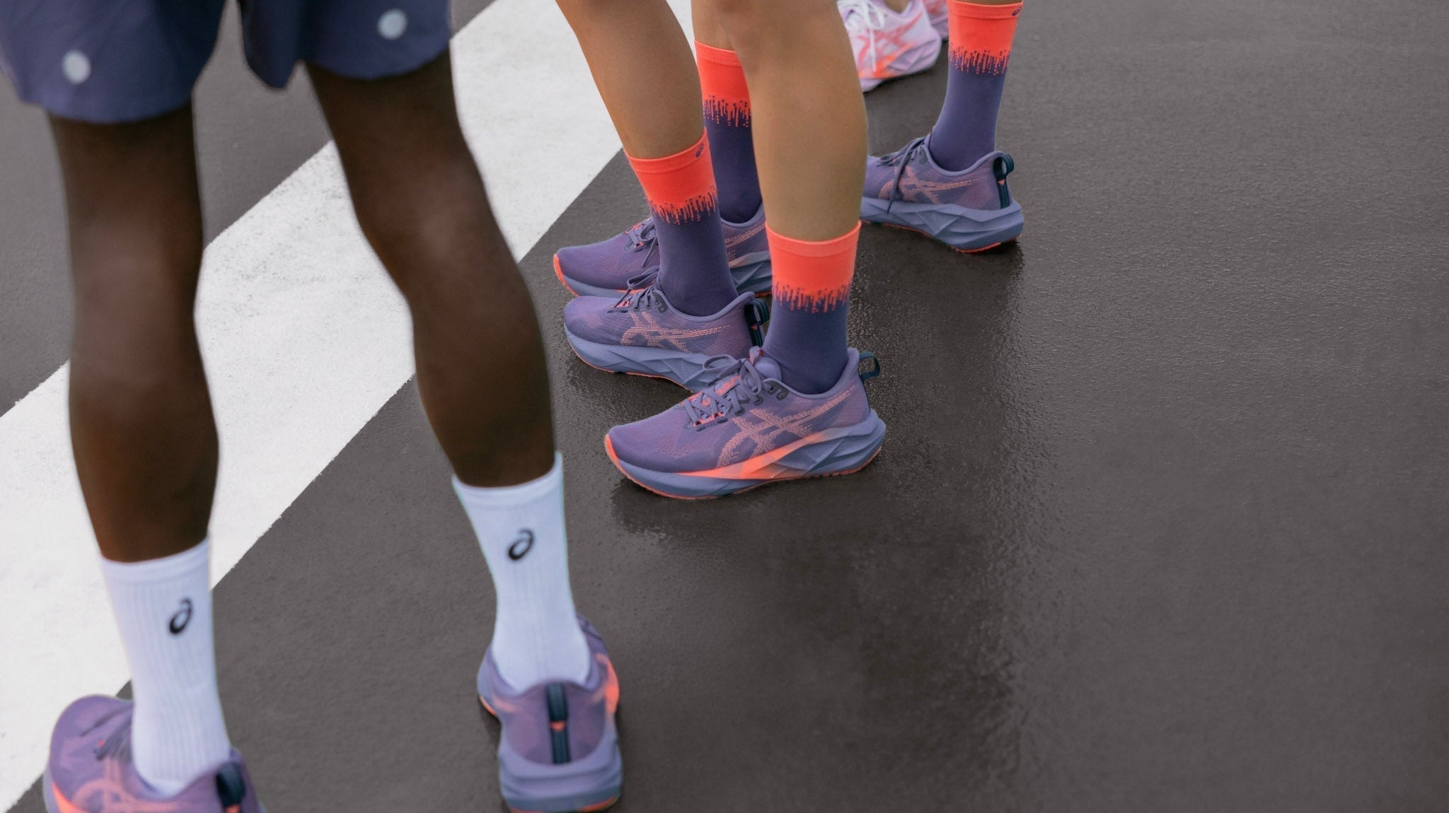 rear and side view of runners wearing Asics Superblast 2