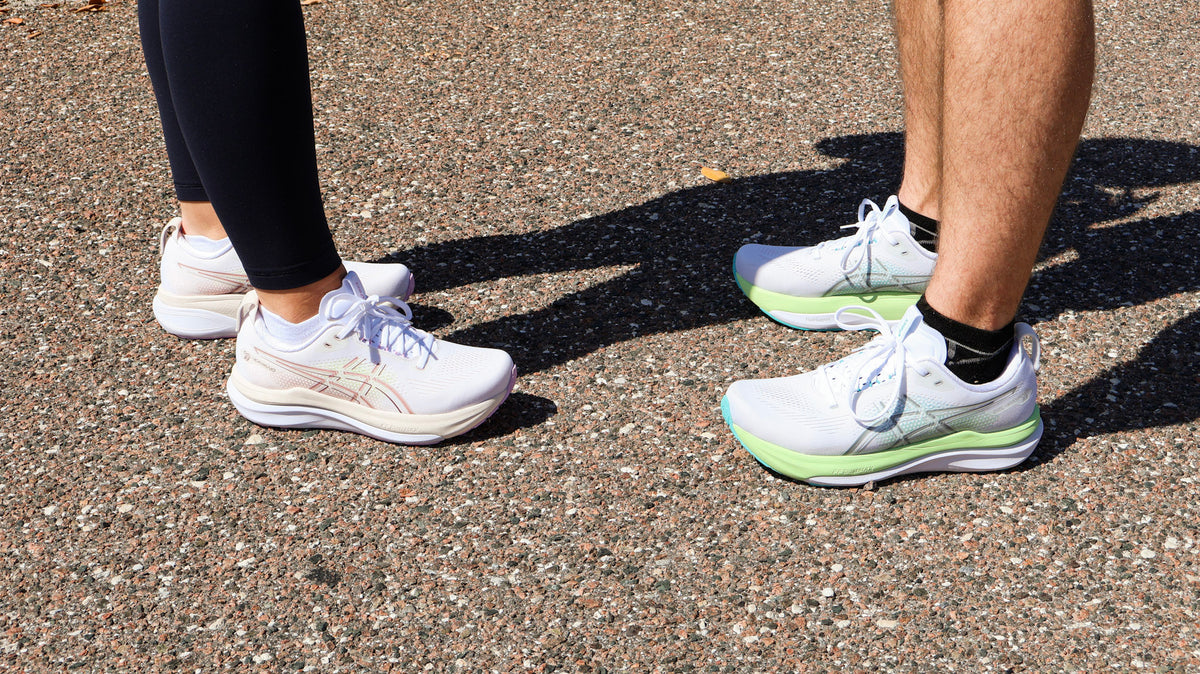 Three stability running shoes side by side showing GuideRails, a medial post, and raised sidewalls with a flared base.