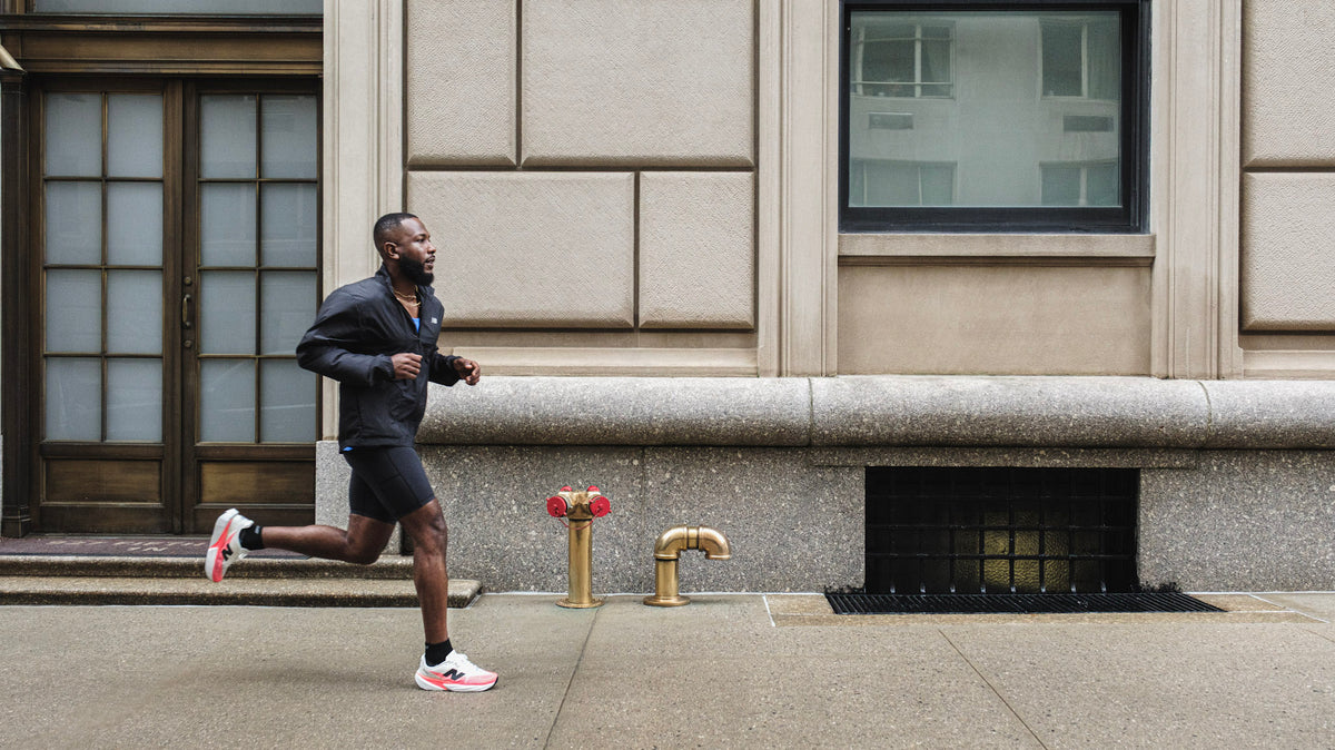 Runner’s flat lay showing a cushioned daily trainer, a high‑stack long‑run shoe, and a lightweight plated racer with workout notes beside them.