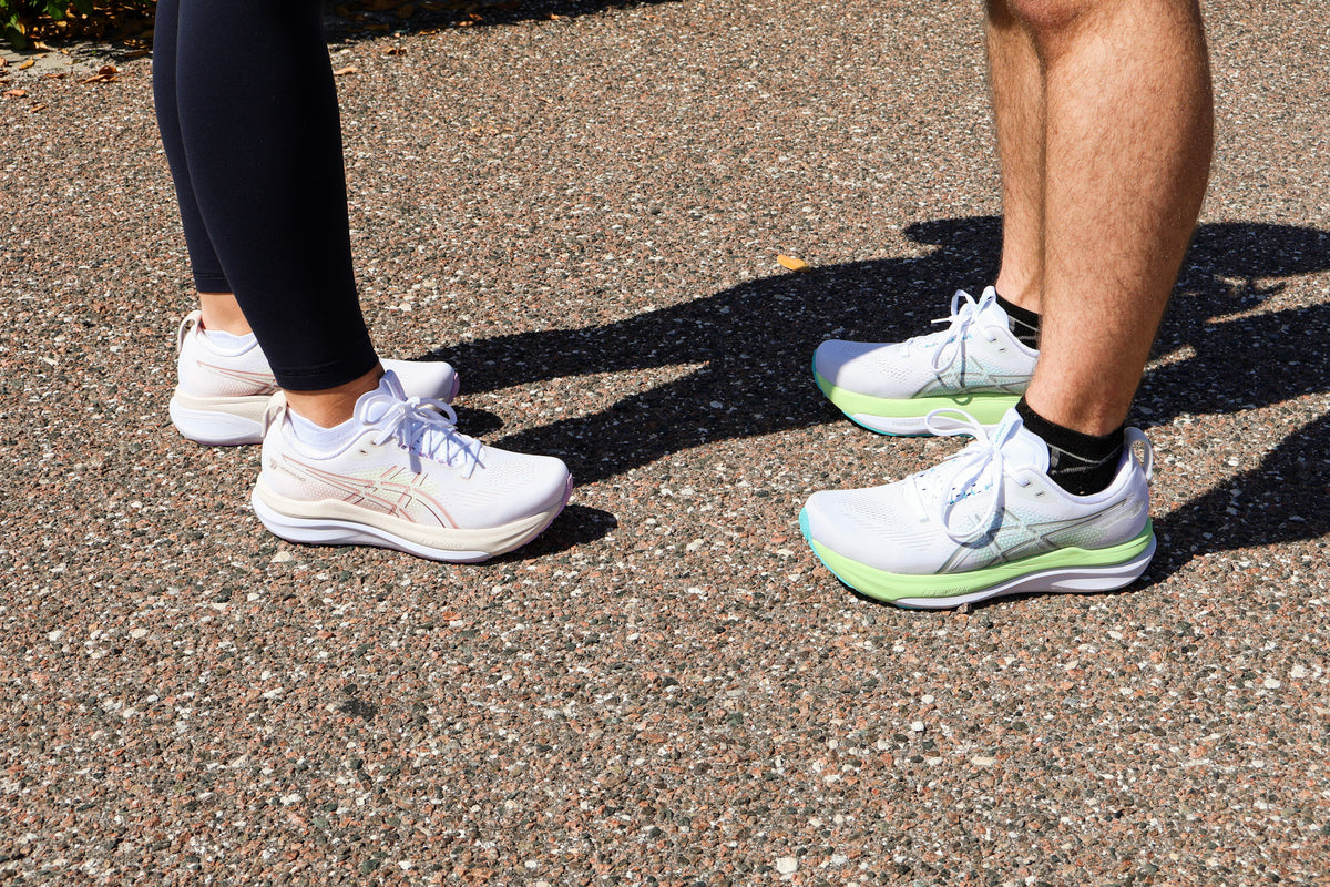 Three stability running shoes side by side showing GuideRails, a medial post, and raised sidewalls with a flared base.