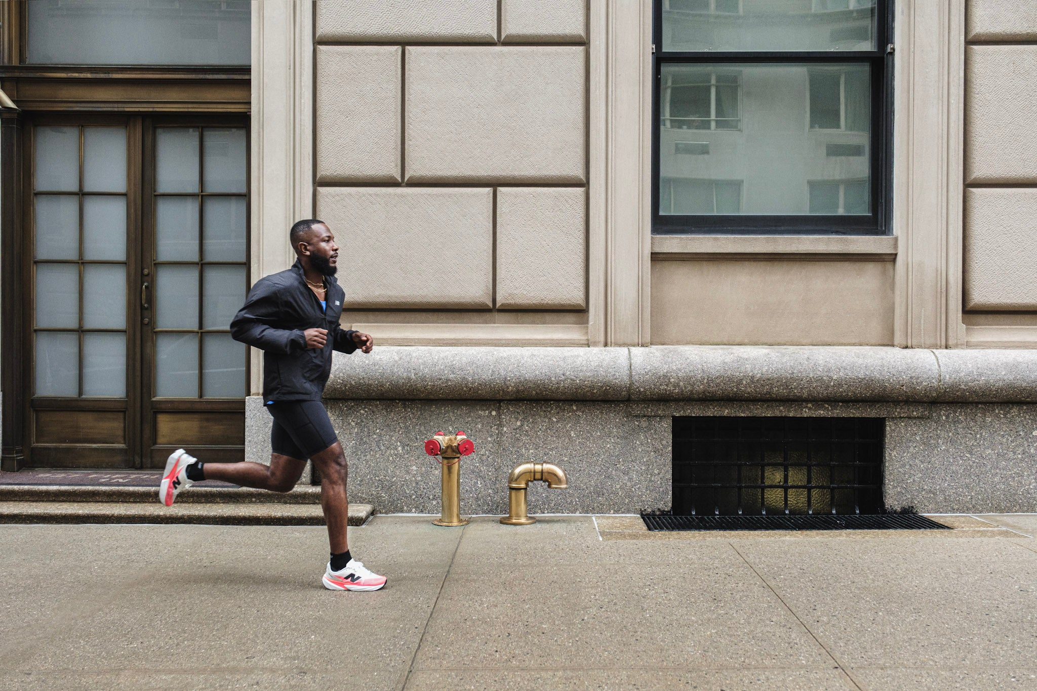 Runner’s flat lay showing a cushioned daily trainer, a high‑stack long‑run shoe, and a lightweight plated racer with workout notes beside them.