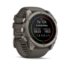 Garmin Fenix 9 sport watch in Titanium with Pebble Gray Band, angled view with activity summary display