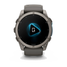 Garmin Fenix 9 sport watch in Titanium with Pebble Gray Band, front view with voice feature display