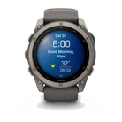 Garmin Fenix 9 sport watch in Titanium with Pebble Gray Band, front view with morning summary display