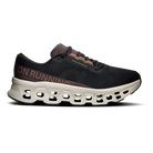On Cloudmonster 3 men's running shoes in Black/Ivory, lateral view