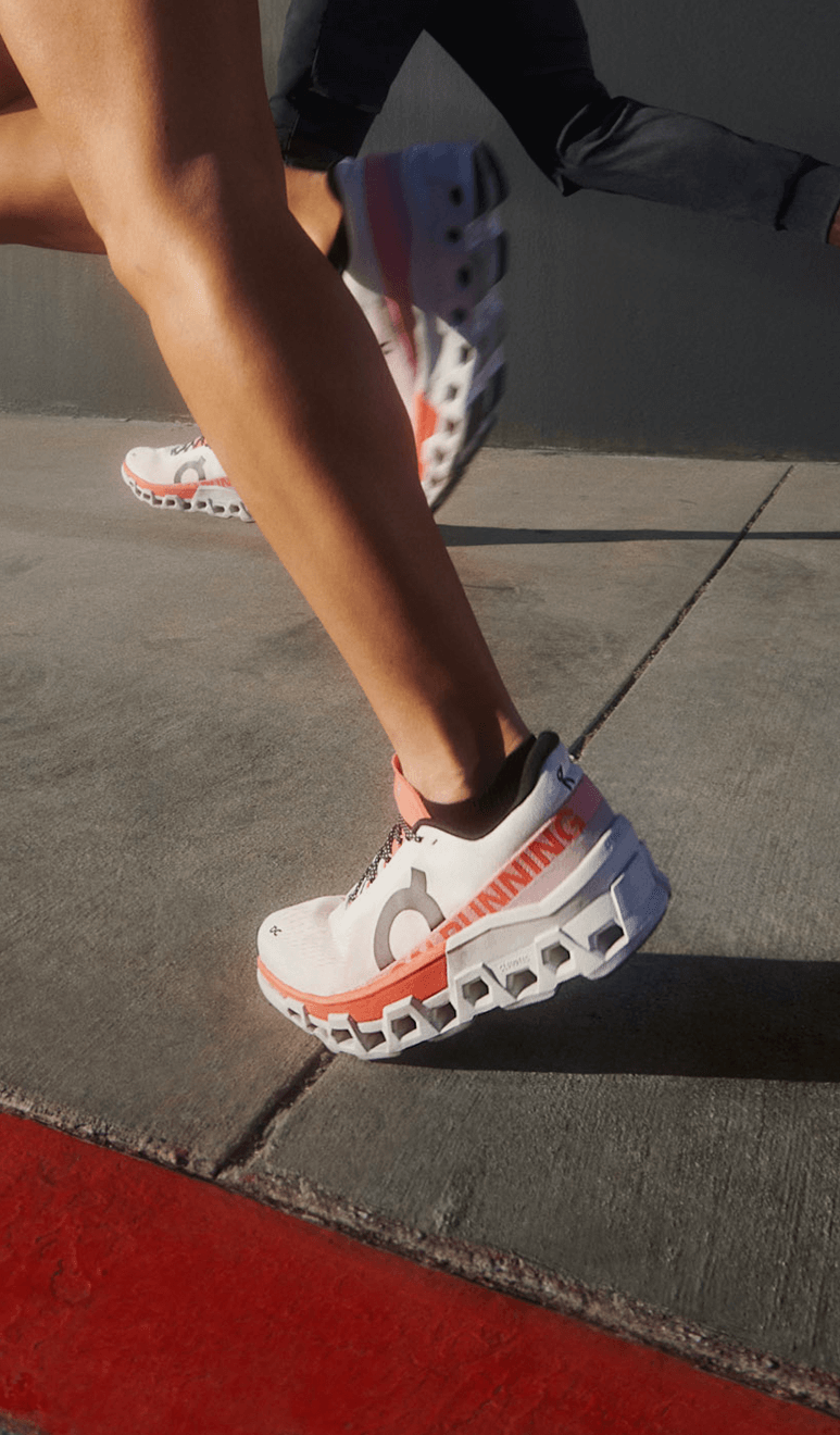 Side profile of a men's on cloud monster 2 while running 