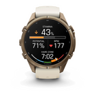 Garmin Fenix 9 Pro sportwatch in Autumn Gold Titanium with Cream/French Gray band, front view with stamina metrics