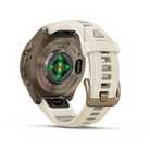 Garmin Fenix 9 Pro sportwatch in Autumn Gold Titanium with Cream/French Gray band, rear sensor view