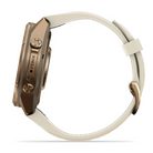 Garmin Fenix 9 Pro sportwatch in Autumn Gold Titanium with Cream/French Gray band, opposite side view