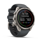 Garmin fēnix 9 Pro smartwatch in Titanium with Graphite/Black band, angled view with activity summary